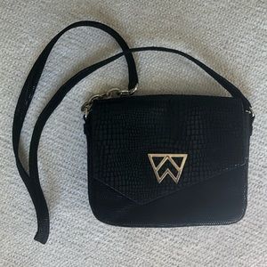Kelley Wynn black purse
